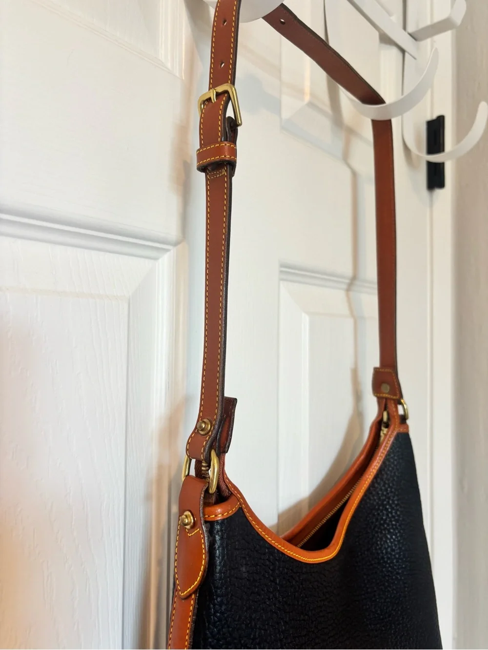 Dooney & Bourke Black Pebbled Leather Shoulder Bag with Brown Trim
